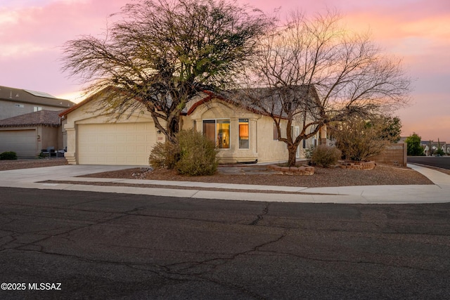 view of front of house with a garage