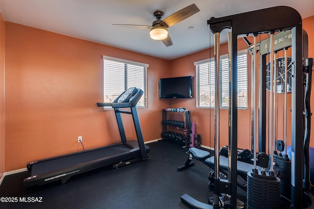 workout area with ceiling fan