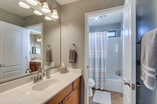 full bathroom featuring tile patterned flooring, vanity, toilet, and shower / tub combo with curtain