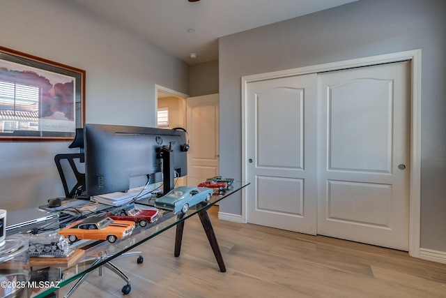 home office featuring light hardwood / wood-style flooring