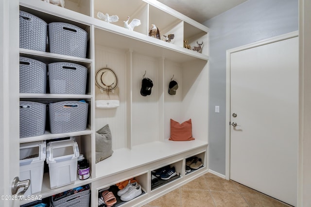 mudroom with light tile patterned floors