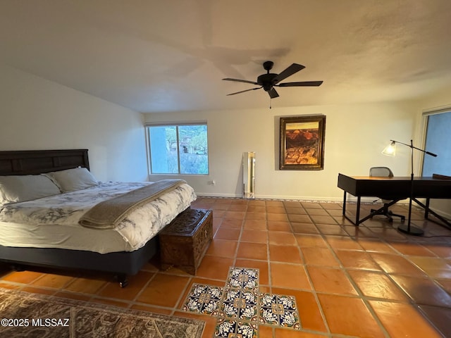 tiled bedroom with ceiling fan