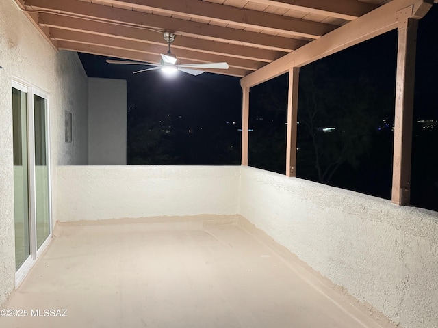 spare room featuring beam ceiling