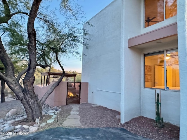 view of property exterior at dusk