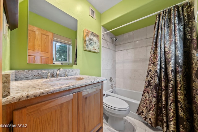 bathroom featuring visible vents, toilet, tile patterned floors, shower / bath combo with shower curtain, and vanity