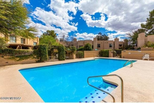 view of pool with a patio