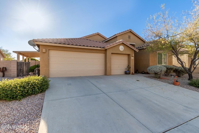 view of front of home with a garage