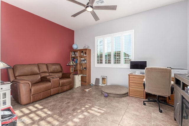 tiled home office featuring ceiling fan