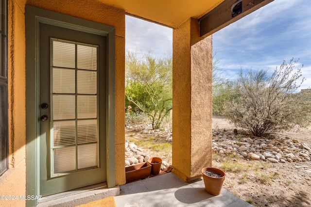 entryway with concrete floors