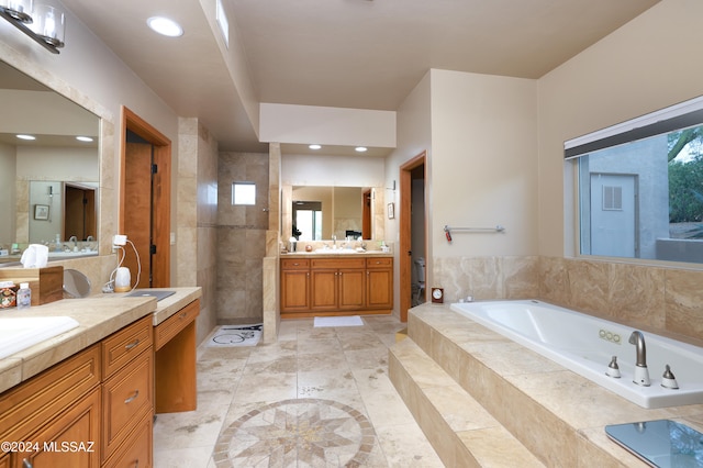 bathroom featuring vanity, tile patterned floors, and independent shower and bath