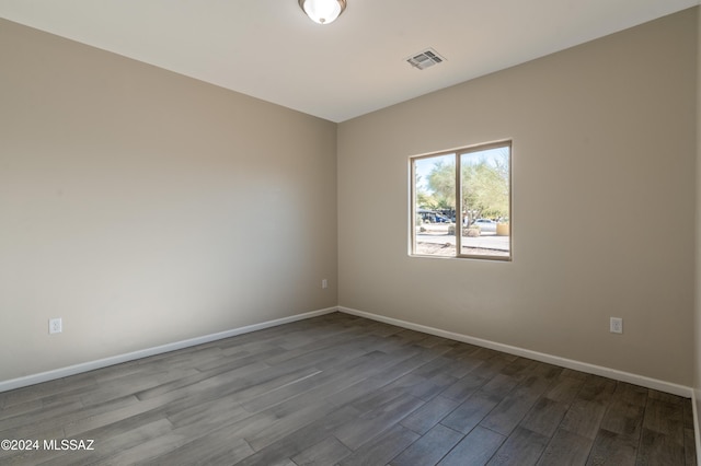 unfurnished room featuring hardwood / wood-style floors