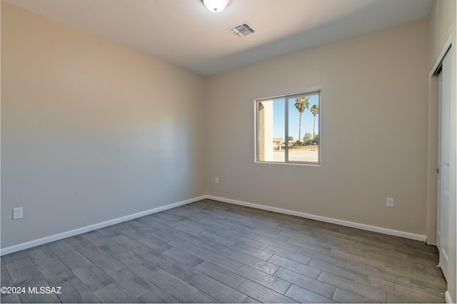 empty room with light wood-type flooring