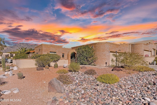 view of front of house featuring a mountain view