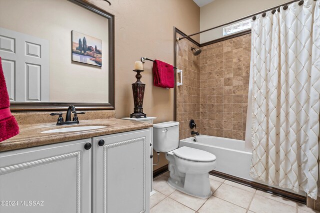 full bathroom featuring tile patterned floors, vanity, shower / bath combo, and toilet