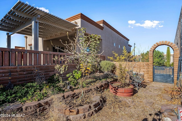 exterior space with a pergola