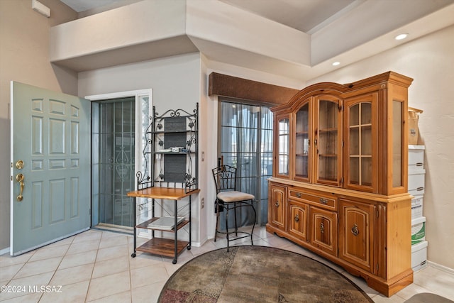 foyer entrance featuring light tile patterned floors