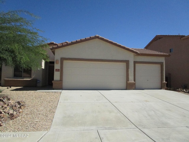 view of front of home featuring a garage