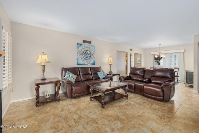 living room featuring an inviting chandelier