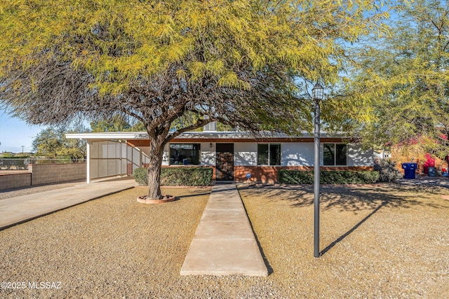 view of front of house with a carport