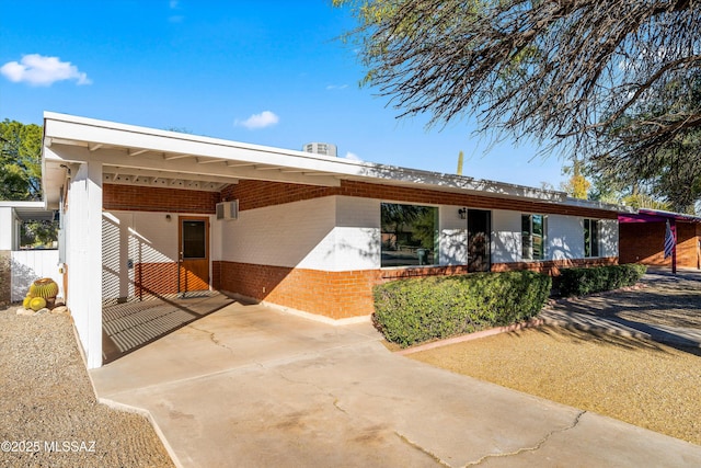 view of front of home with a carport