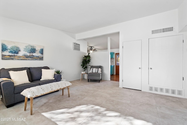 living room with beamed ceiling and ceiling fan