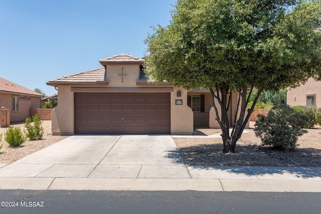 view of front of property featuring a garage