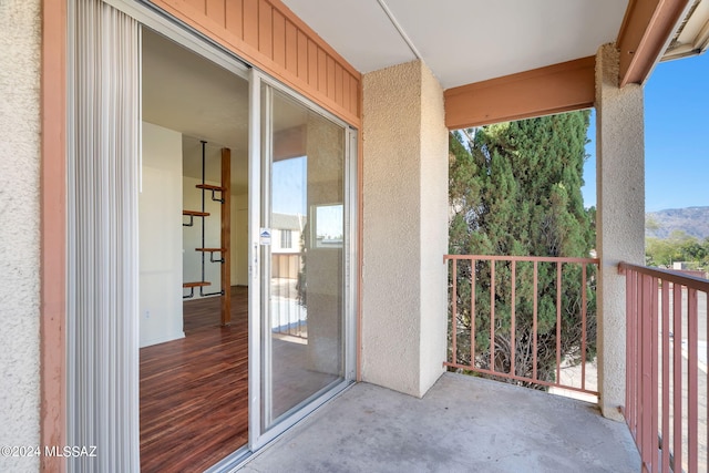 balcony featuring a mountain view