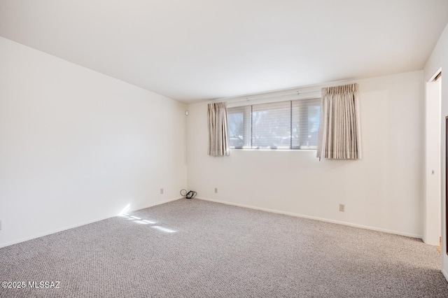 spare room with carpet flooring