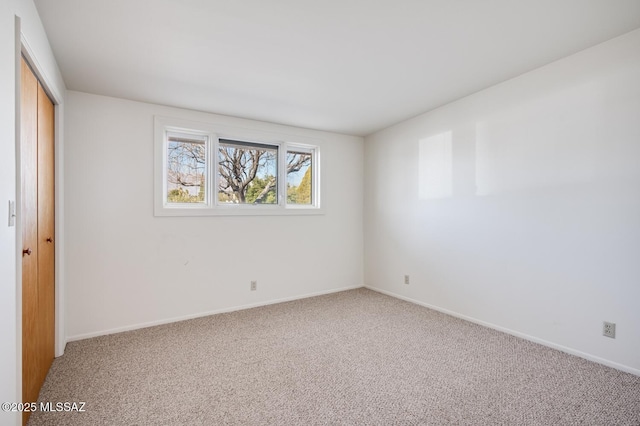 view of carpeted spare room