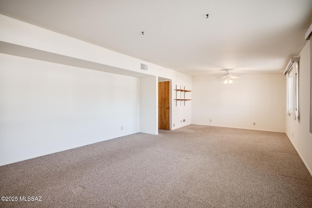 carpeted empty room with ceiling fan