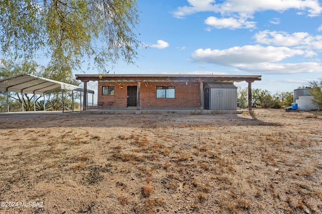 exterior space with a carport