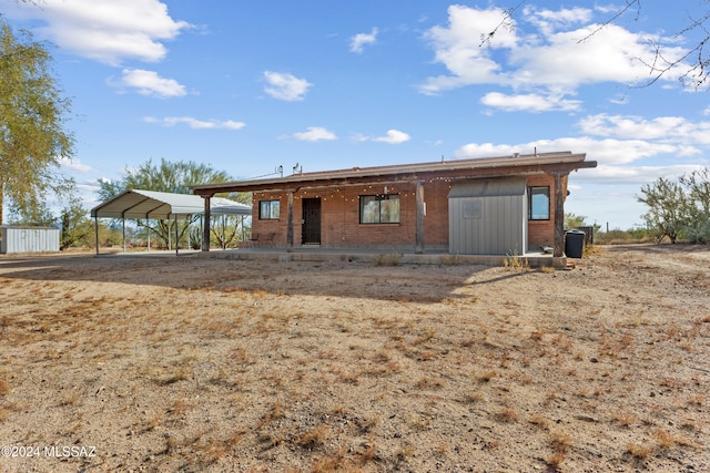 exterior space featuring a carport