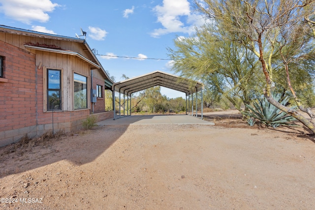 view of yard featuring a carport