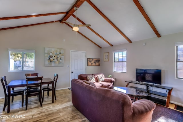 living room featuring beamed ceiling, ceiling fan, and high vaulted ceiling