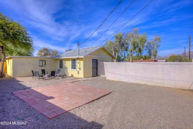 rear view of house with a patio area