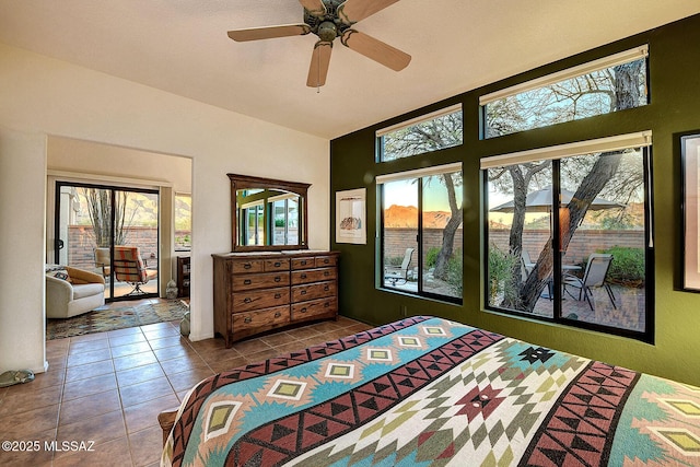 bedroom featuring tile patterned flooring and ceiling fan