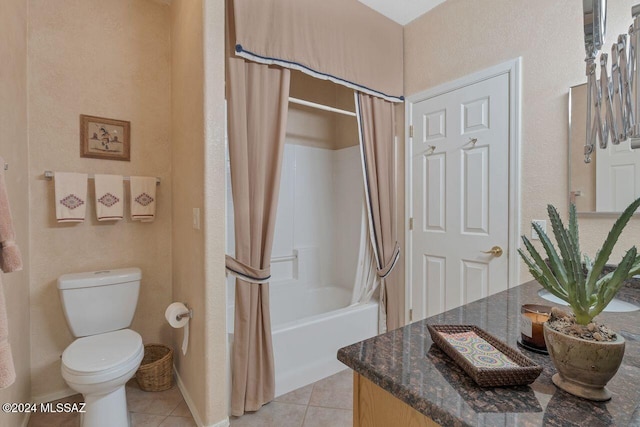 bathroom featuring tile patterned floors, shower / tub combo with curtain, and toilet