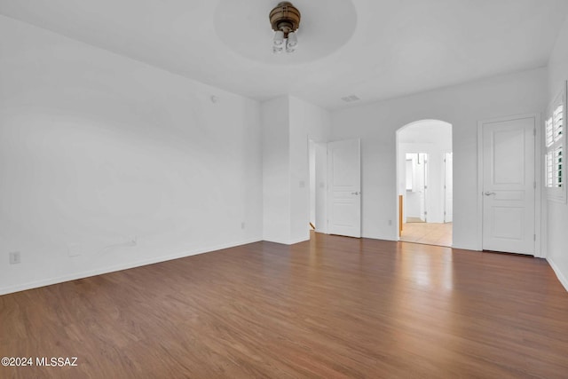 spare room featuring ceiling fan and wood-type flooring