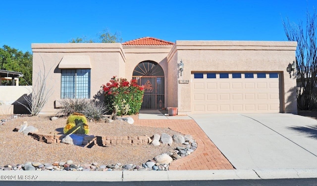 view of front of property with a garage