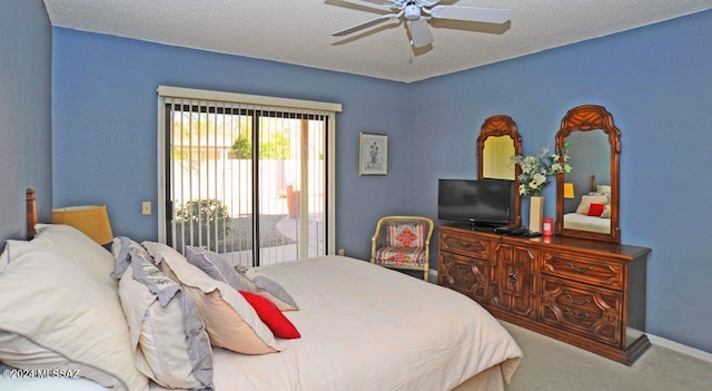 bedroom featuring access to exterior, carpet, a textured ceiling, and ceiling fan