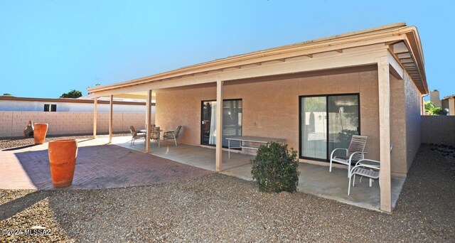 rear view of property with a patio