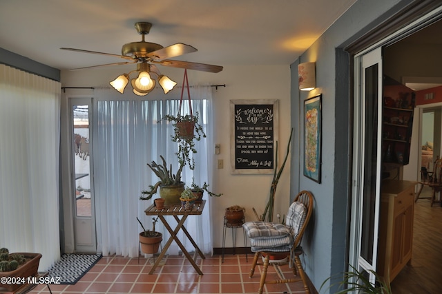 interior space featuring ceiling fan