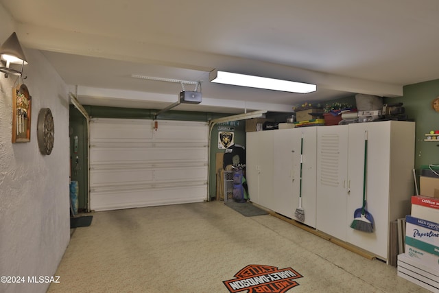 garage featuring a garage door opener