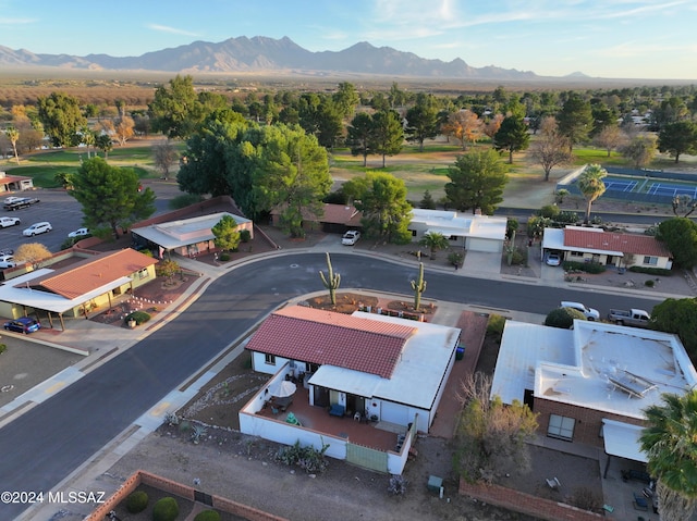 drone / aerial view featuring a mountain view