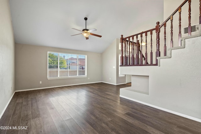 unfurnished living room with vaulted ceiling, dark hardwood / wood-style floors, and ceiling fan