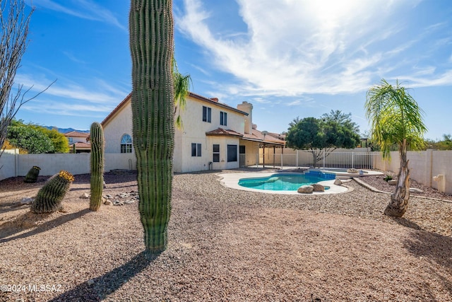 view of pool featuring a patio