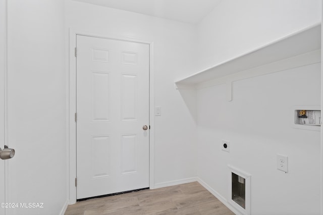 washroom featuring hookup for an electric dryer, light wood-type flooring, and washer hookup