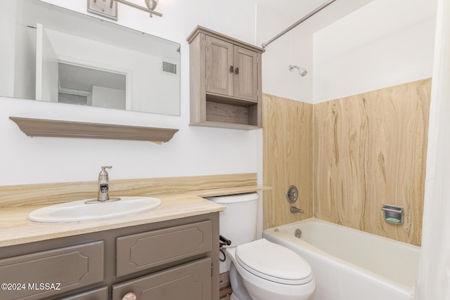 full bathroom with vanity, shower / bath combination, and toilet