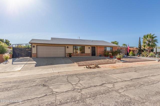 single story home featuring a garage