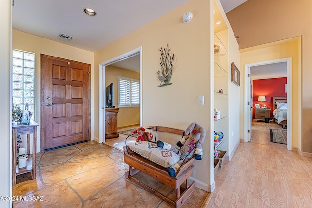 entrance foyer featuring light hardwood / wood-style floors